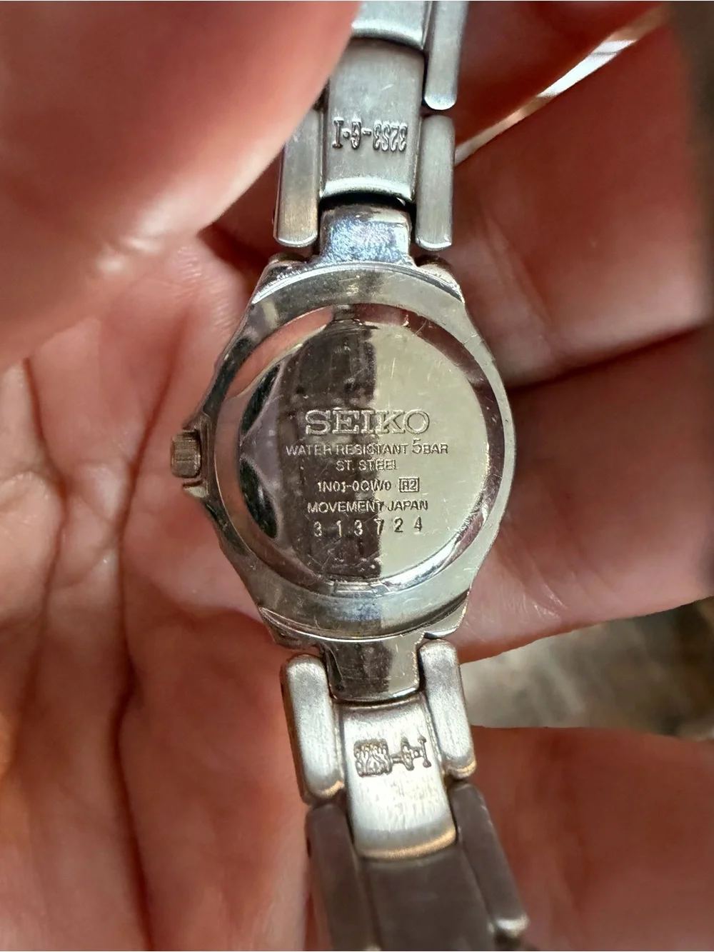 Seiko Silver Stainless Steel Watch  Iridescent mother of pearl face with diamond
